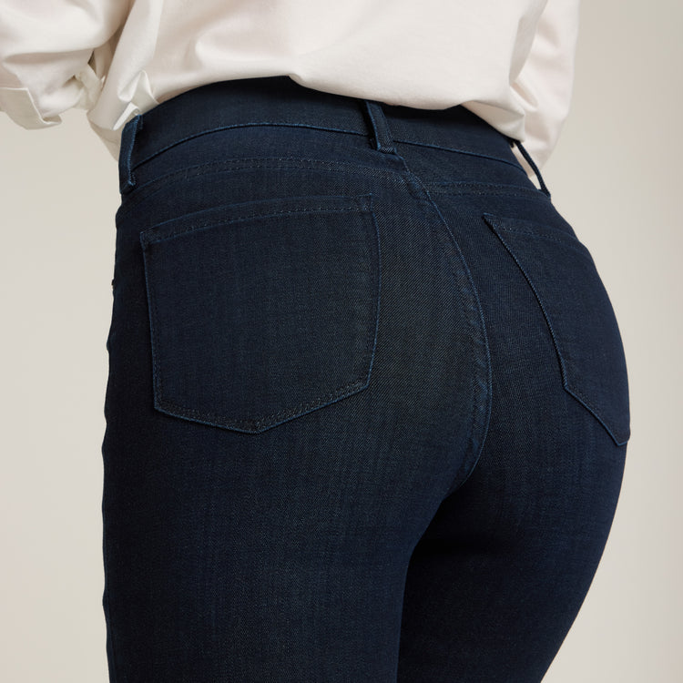 Women wearing Medium/Dark Blue High Rise Miniboot Ankle Jane Jeans