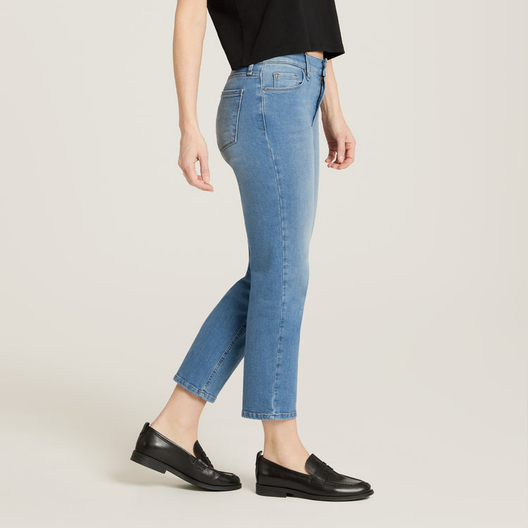Women wearing Light Blue Mid Rise Slim Cropped Leg Logan Jeans