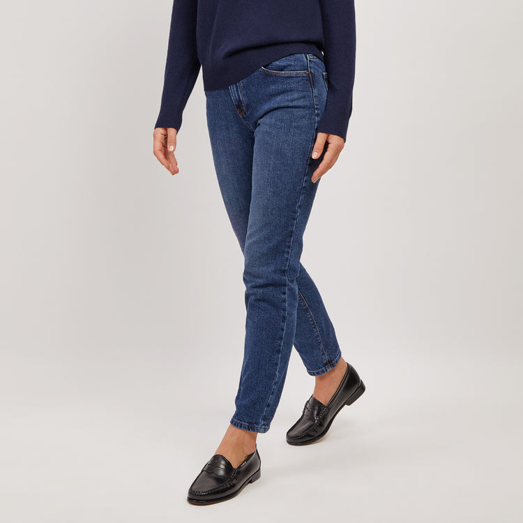 Women wearing Light/Medium Blue High Rise Mom Oliver Jeans