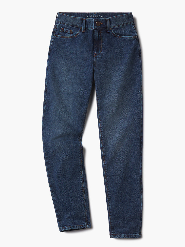 Women wearing Light/Medium Blue High Rise Mom Oliver Jeans