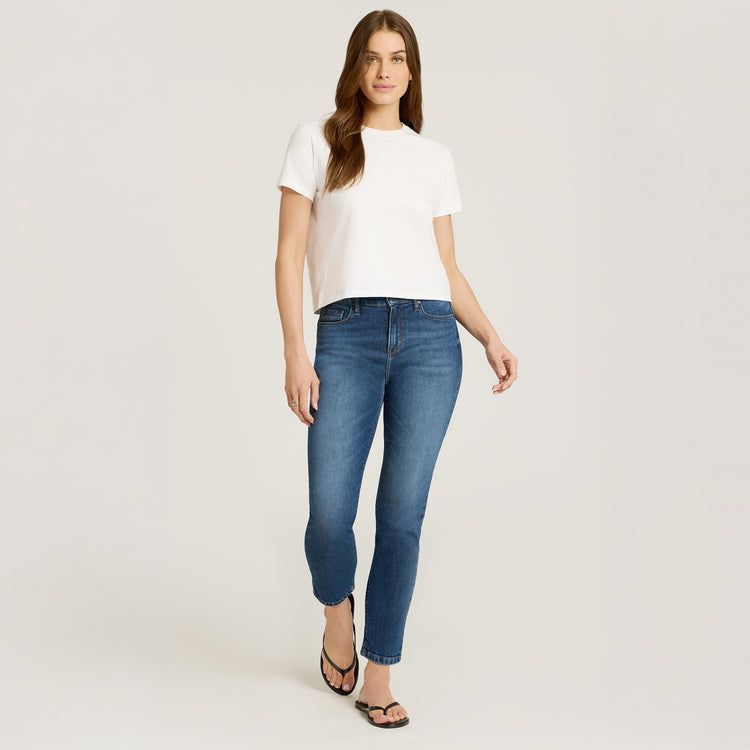 Women wearing Medium Blue High Rise Mom Ridge Jeans