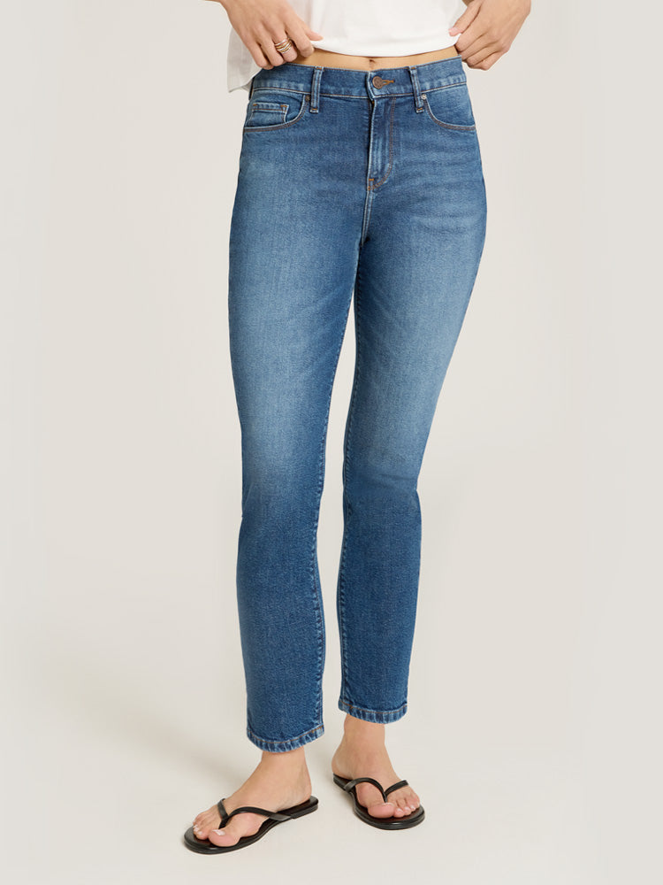 Women wearing Medium Blue High Rise Mom Ridge Jeans