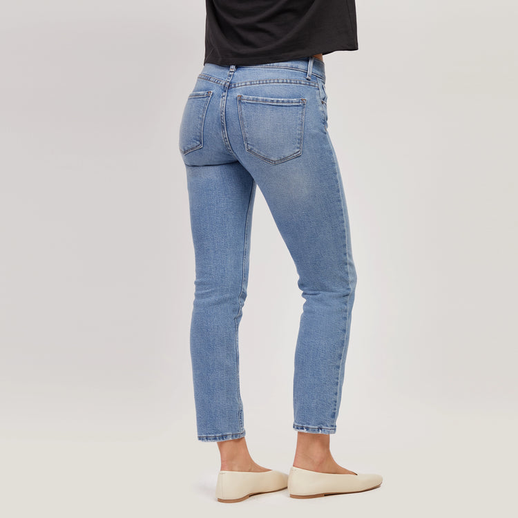 Women wearing Light Blue Mid Rise Slim Straight Hubert Jeans
