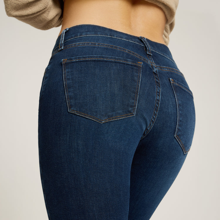Women wearing Dark Blue Logan Mid Rise Slim Straight Jeans