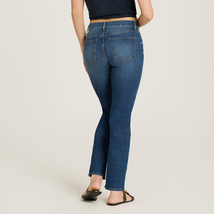 Women wearing Medium Blue Mid Rise Slim Straight Ridge Jeans