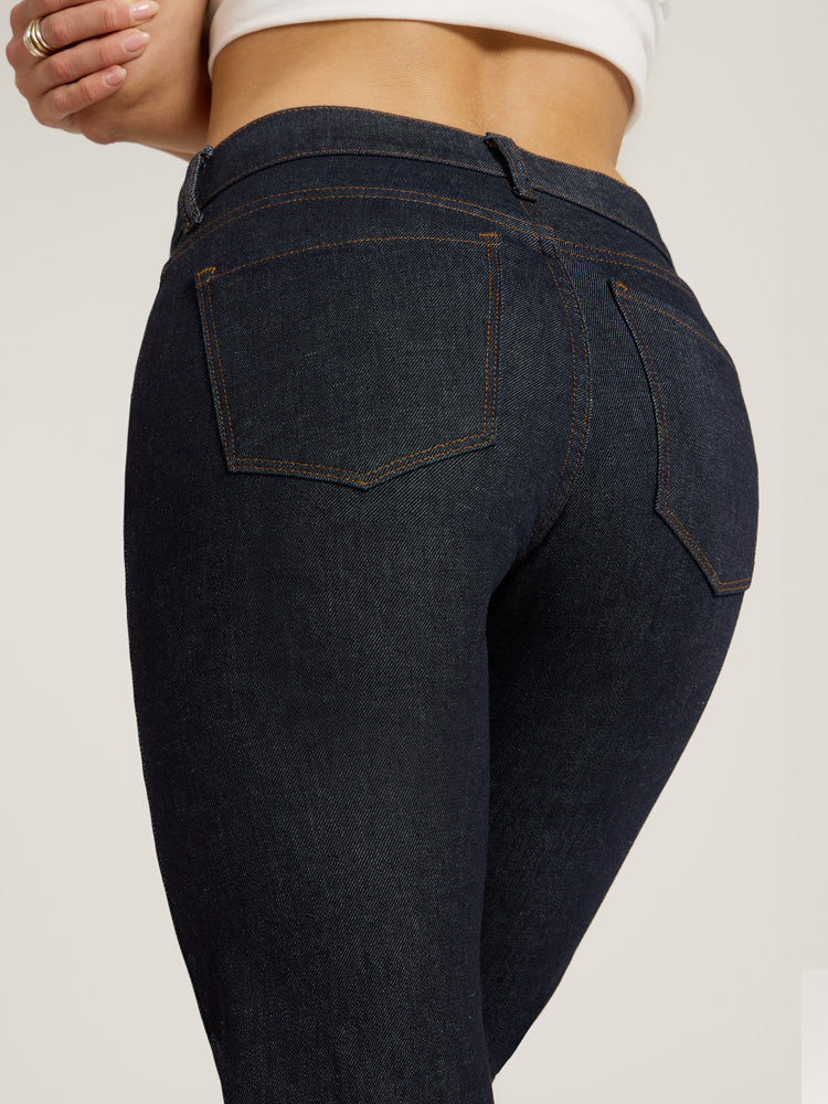 Women wearing Dark Blue Mid Rise Slim Straight Ridge Jeans