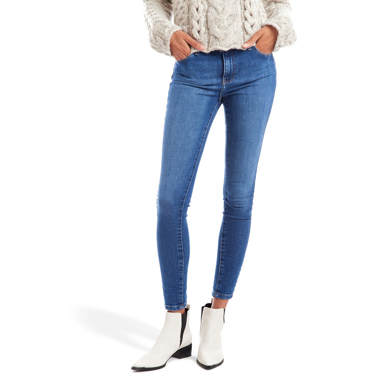 Women wearing Light/Medium Blue High Rise Skinny Beekman Jeans