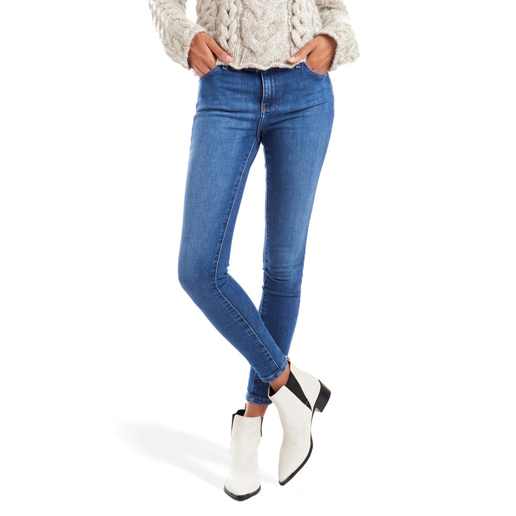 Women wearing Light/Medium Blue High Rise Skinny Beekman Jeans