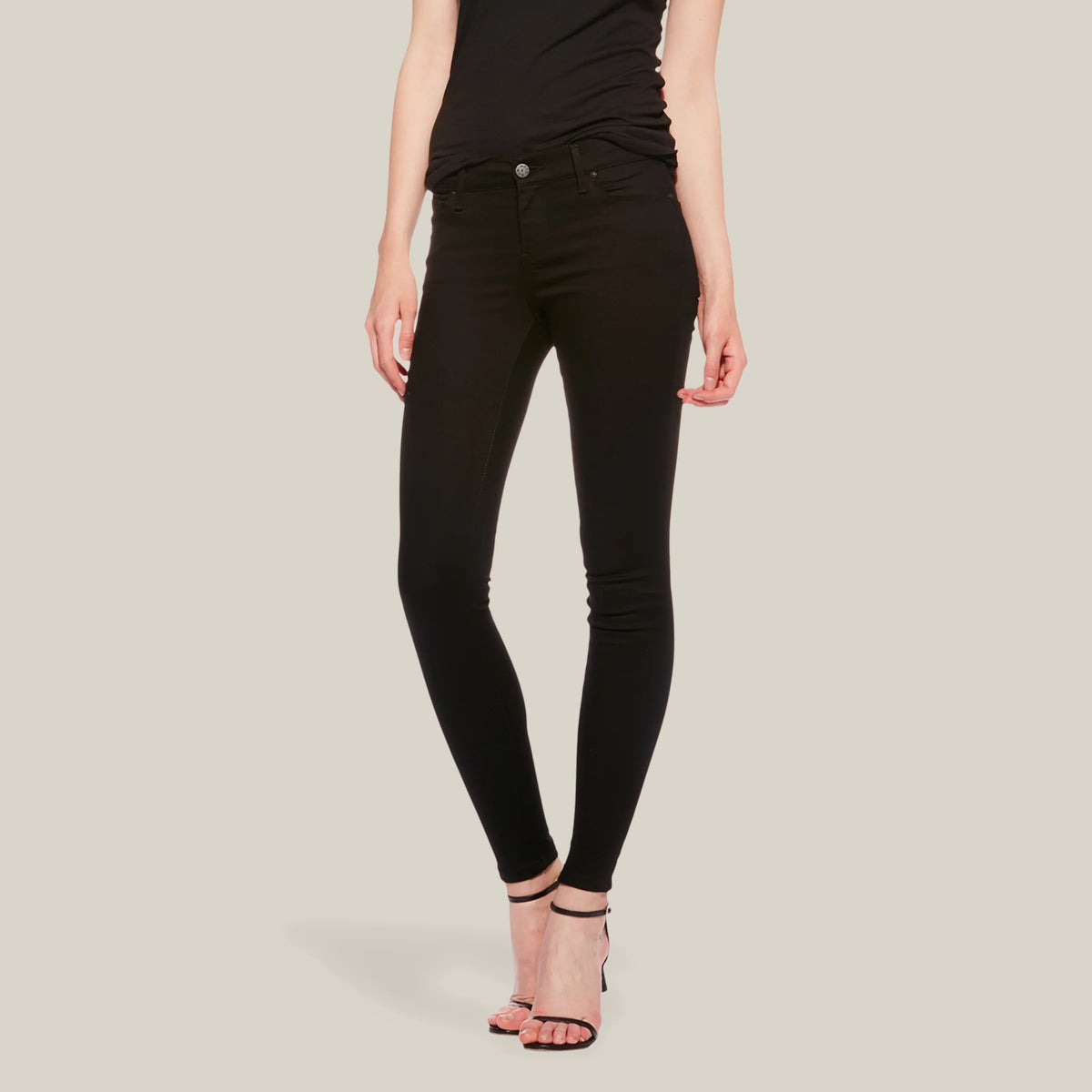 Women wearing Negro Mid Rise Skinny Bond Jeans