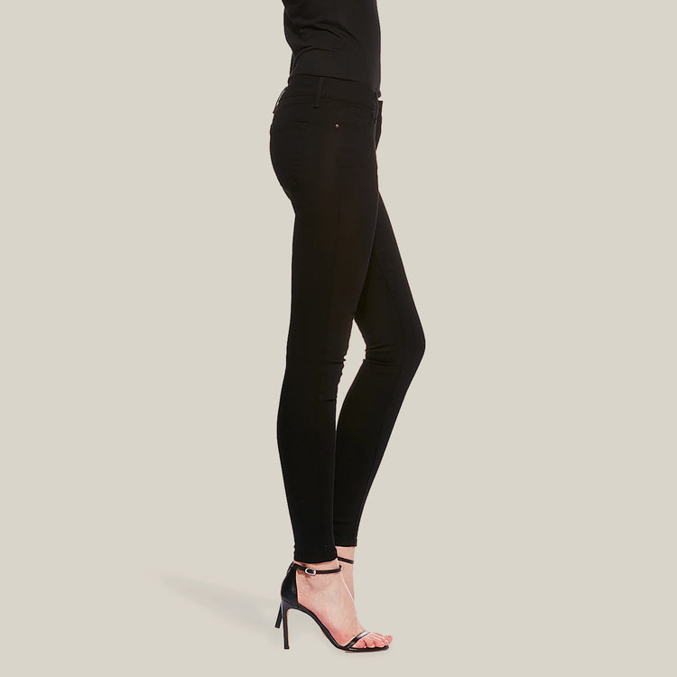 Women wearing Negro Mid Rise Skinny Bond Jeans