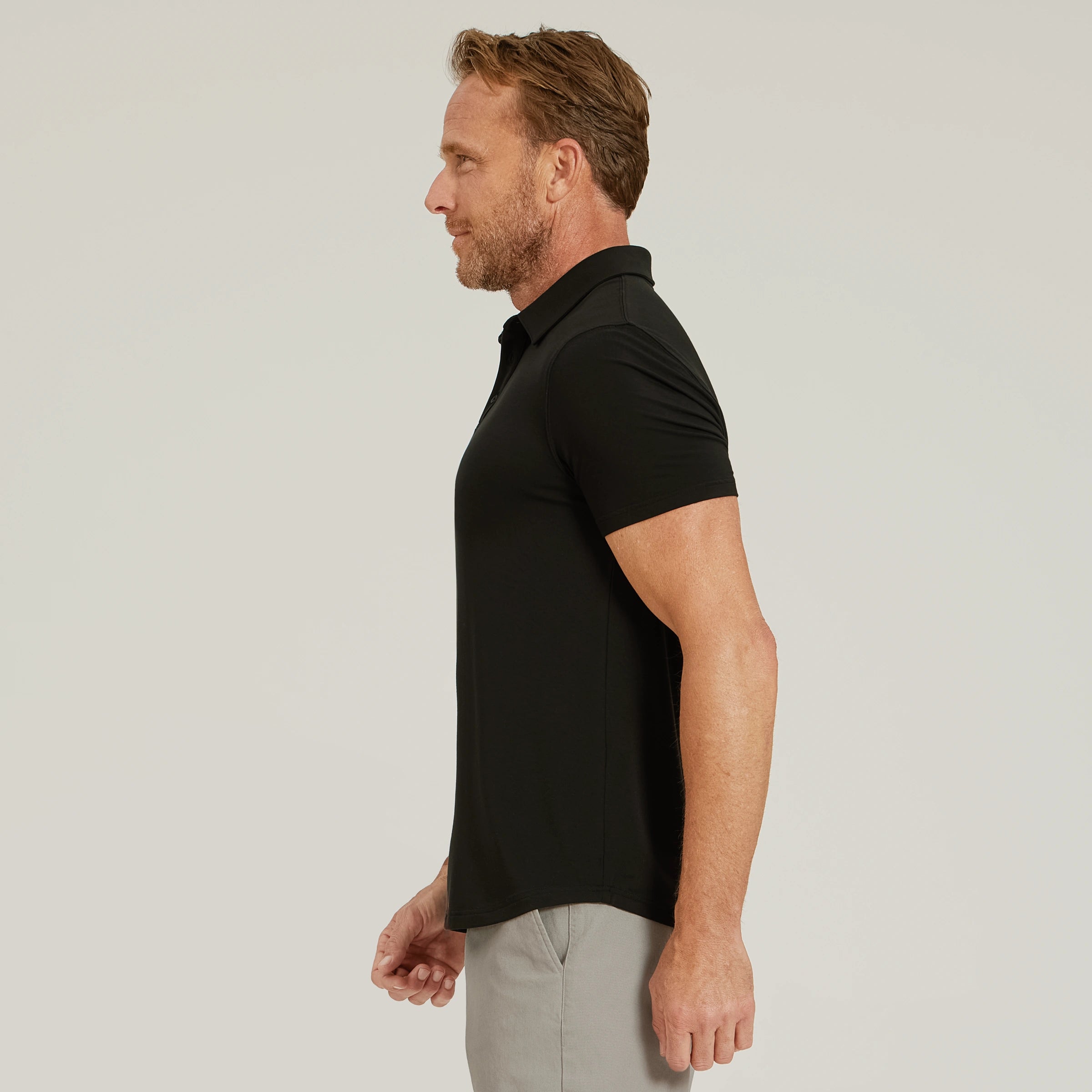 Men wearing Black Luxe Performance Polo