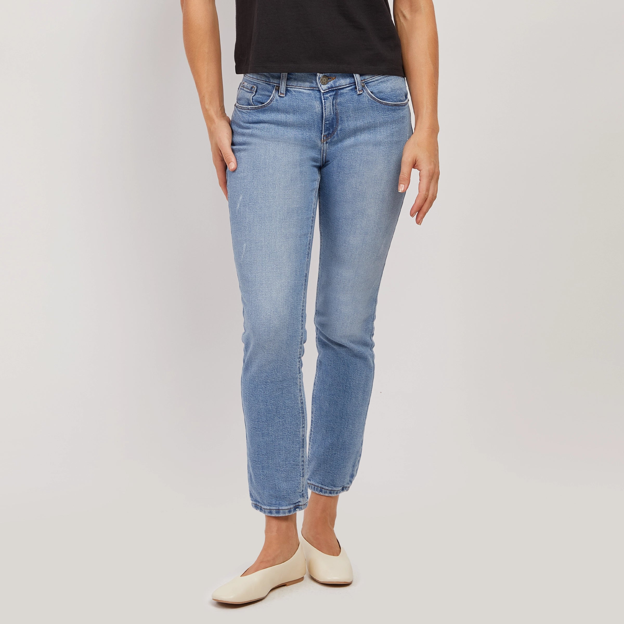 Women wearing Light Blue Mid Rise Slim Straight Hubert Jeans